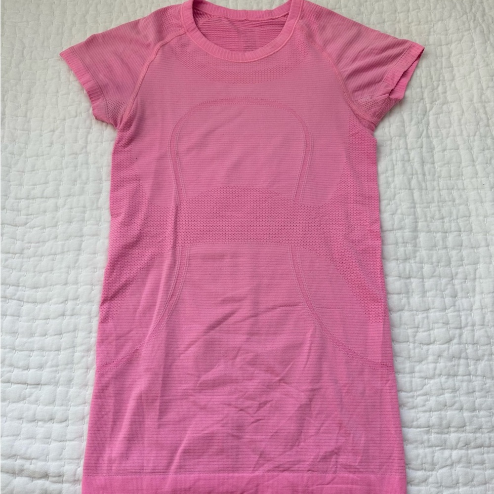 Bright pink Lululemon swiftly tech